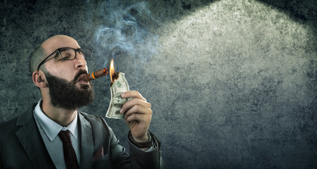 money burning - businessman arrogant