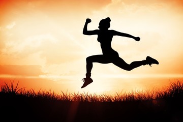 Aufkleber - Composite image of fit brunette running and jumping