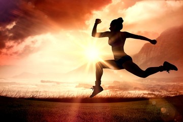 Aufkleber - Composite image of fit brunette running and jumping