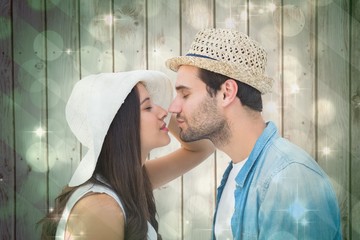Poster - Composite image of happy hipster couple about to kiss