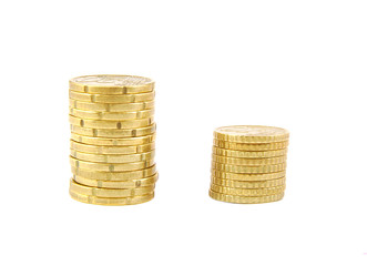 Two euro coins piles isolated on a white background.