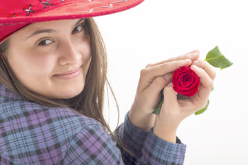 Girl with red hat holding an red rose