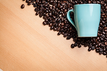 Wall Mural - Cup on coffee beans