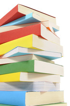 Untidy Stack Pile Of Colorful Paperback Books Isolated White Background Photo