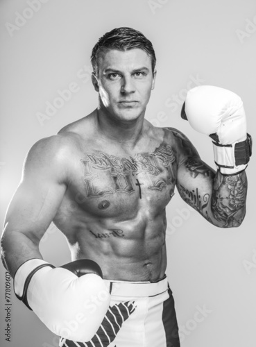 Naklejka na szybę An isolated photo of a boxer wearing white