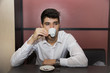 © theartofphoto - Stressed Handsome Man Having a Cup of Coffee at the Cafe