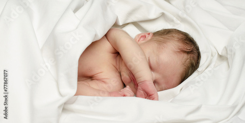 baby sleeping on face
