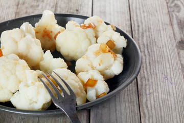 Canvas Print - Flavored Boiled Cauliflower on Plate with Fork