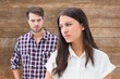 © WavebreakmediaMicro - Composite image of angry brunette not listening to her boyfriend