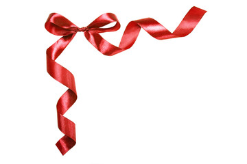 Wall Mural - red ribbon with a bow. Isolated on white background