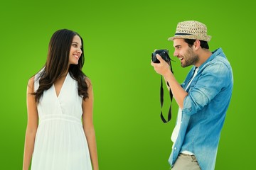 Poster - Handsome hipster taking a photo of pretty girlfriend