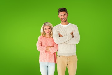 Poster - Composite image of attractive couple smiling with arms crossed