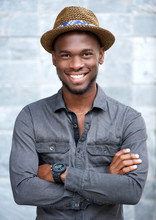 Charming African American Man Smiling With Hat