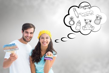 Poster - Composite image of happy young couple painting together