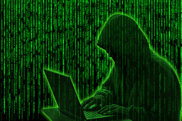 Wall Mural - Conceptual image of a hacker on green matrix background