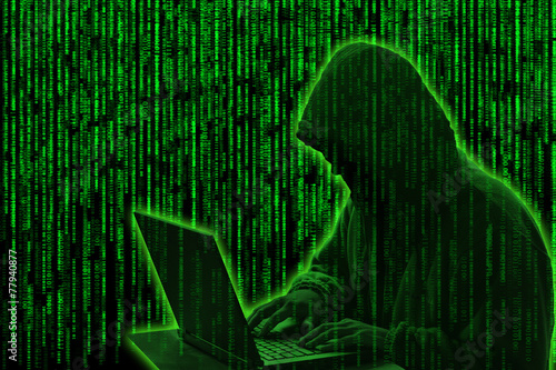 Fotografía Conceptual image of a hacker on green matrix background