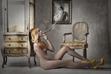 Naked lady smocking a cigar