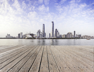 Wall Mural - Empty board with skyline and cityscape background