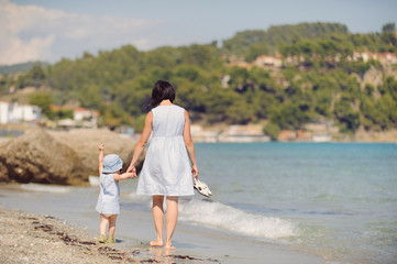 Poster - Mother and Girl Walking on Beach