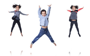 A cute african american little boy jump isolated on white backgr