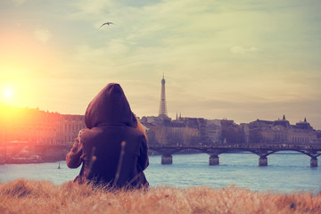 Seine river and Eiffel tower with lonesome girl. Mosaic.