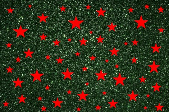 Wall Mural -  - Red stars on green glitter background