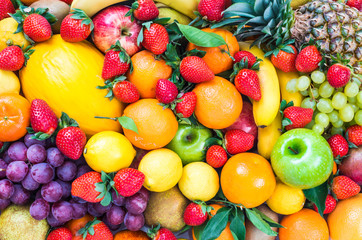 Fresh fruits various background. Healthy food.