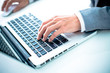 © Nonwarit - Closeup of businessman hands typing on laptop computer