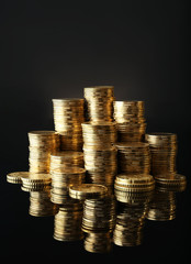 Sticker - Pile of coins on dark background