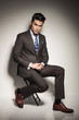 © Viorel Sima - young business man holding his hands together while sitting