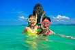 © Iuliia Sokolovska - Family vacation, mother and kid snorkeling in sea