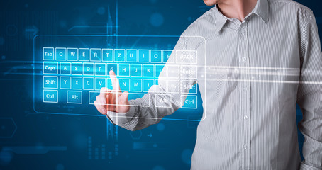 Businessman pressing virtual type of keyboard