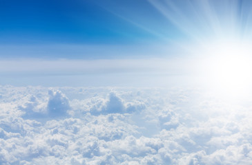 Wall Mural - blue sky with clouds and sun