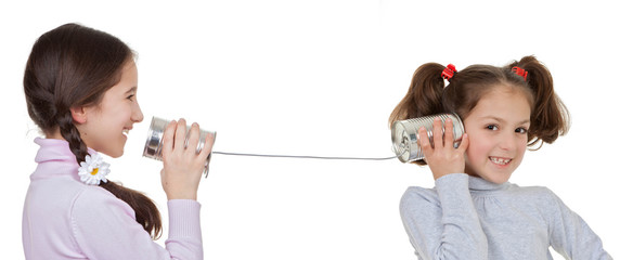 children playing with tin can and string telephone