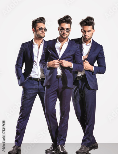 Tapeta ścienna na wymiar three poses of an elegant smart casual fashion business man