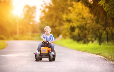 Little boy playing outside