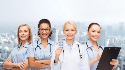 Sticker - smiling female doctor and nurses with stethoscope