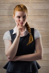 Poster - Composite image of thinking redhead businesswoman