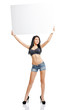 © Aleksey Sergeychik - Sexy young girl standing and holding a white plate isolated on w