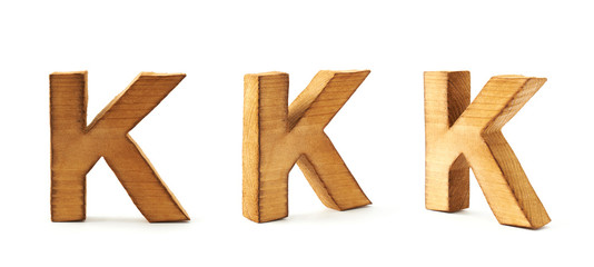 Set of three block wooden letters isolated