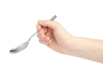 Male hand holding an empty spoon