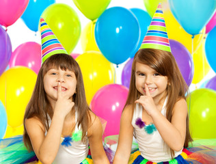 Two little girls at birthday party