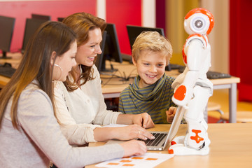 Wall Mural - Child playing and learning with robot