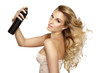© Paul Collection - beautiful model applying spray  on windy hair