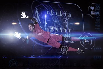 Poster - Composite image of fit goal keeper jumping up