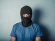 © LoloStock - Scary man wearing a balaclava