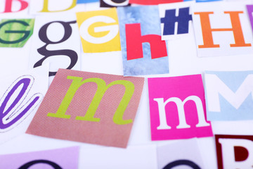 Colorful newspaper letters as background