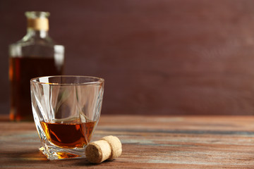 Poster - Whiskey on wooden background