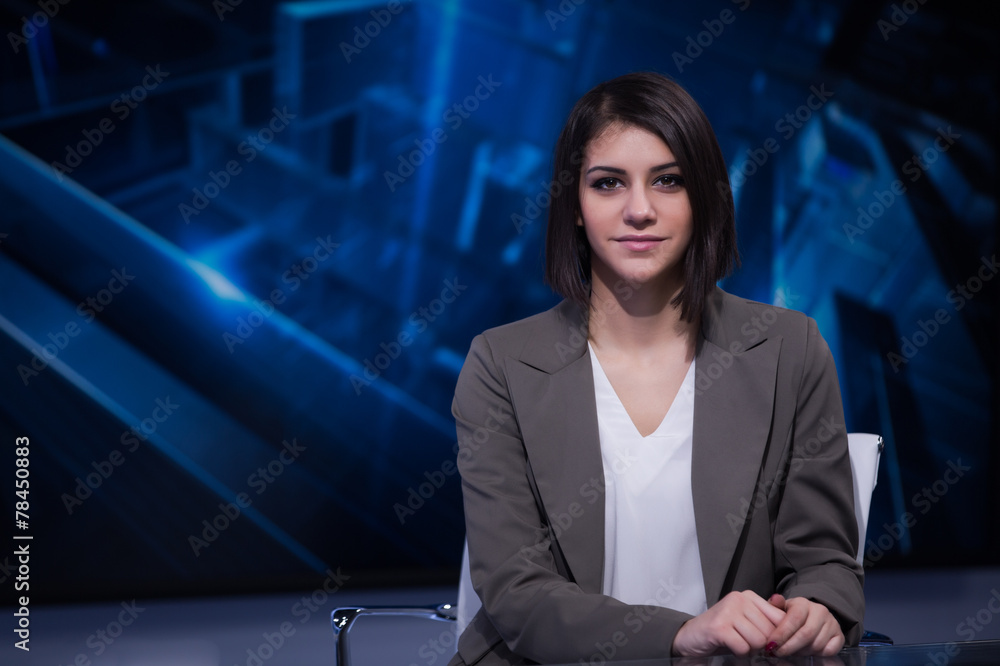 Beautiful television announcer at studio during live broadcast - obrazy, fototapety, plakaty 