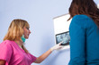 © VICTOR TORRES - Dentist Examining a Radiography with a Patient